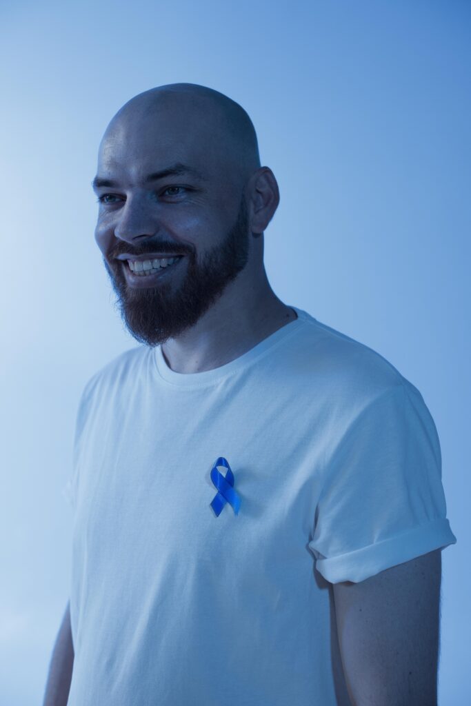 portrait man with prostate cancer ribbon